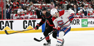 Slavin Owns Game 1 Loss: ‘I Handed Them the Game’ Jaccob Slavin Carolina Hurricanes turns puck over to Nick Suzuki Montreal Canadiens Game 1 Eastern Conference Final May 21 2026 Lenovo Center