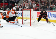 Taylor Hall Injury: Hurricanes Winger Week-to-Week Taylor Hall Carolina Hurricanes behind net Game 2 Stanley Cup Playoffs Second Round Philadelphia Flyers May 4 2026