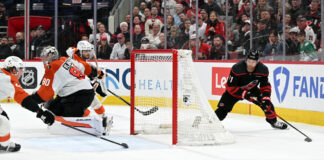 Taylor Hall OT Winner Puts Hurricanes Up 2-0 on Flyers Taylor Hall Carolina Hurricanes behind net Game 2 Stanley Cup Playoffs Second Round Philadelphia Flyers May 4 2026