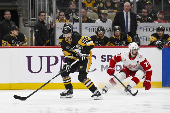 NHL: MAR 31 Red Wings at Penguins Erik Karlsson trade rumors Pittsburgh Penguins defenseman skating with the puck