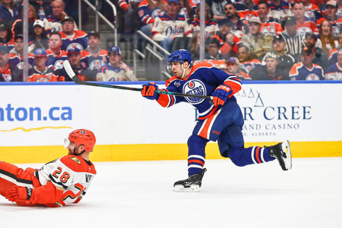 NHL: APR 22 Playoffs First Round Ducks at Oilers Edmonton Oilers defenseman Evan Bouchard shoots against the Anaheim Ducks in the 2026 Stanley Cup Playoffs