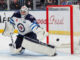Hellebuyck Trade: Jets Want ‘the Sun, the Moon and the Stars’ Connor Hellebuyck Winnipeg Jets goalie makes a save amid NHL trade rumors