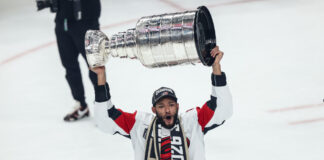 Islanders Fans Schemed Into Hurricanes’ Stanley Cup Party Carolina Hurricanes defenseman K'Andre Miller hoists the Stanley Cup after Game 6 of the 2026 Final