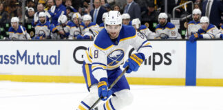 Sabres Trade Kesselring to Sharks, Move Up to No. 20 Michael Kesselring Buffalo Sabres defenseman picks up the puck during 2026 Stanley Cup Playoffs