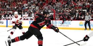 Hurricanes Trying to Trade Kotkaniemi, Won’t Buy Out Deal Jesperi Kotkaniemi Carolina Hurricanes center shoots the puck NHL trade buyout