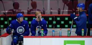 Canucks Turned Down by Memorial Cup Coach Ahokas Vancouver Canucks head coach Manny Malhotra with Quinn Hughes and Elias Pettersson at training camp