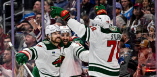 Minnesota Wild left wing Nick Foligno celebrates his goal with brother Marcus Foligno and Nico Sturm in Game 5 of the Stanley Cup Playoffs Second Round against the Colorado Avalanche at Ball Arena in Denver on May 13 2026