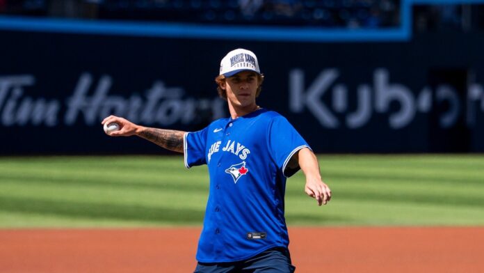mckenna-first-pitch-blue-jays-2026 Gavin McKenna throws first pitch Blue Jays game Maple Leafs No. 1 pick 2026 NHL Draft