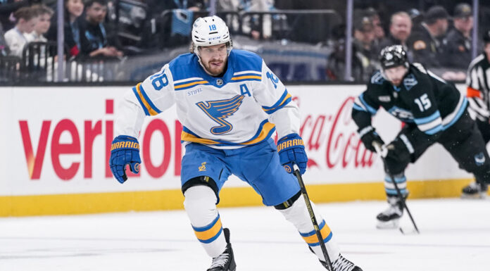 Robert Thomas St. Louis Blues center skates with the puck