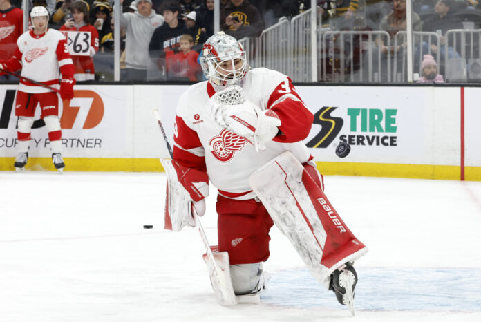 NHL: DEC 03 Red Wings at Bruins Sebastian Cossa Detroit Red Wings goalie makes a save before Utah Mammoth signing