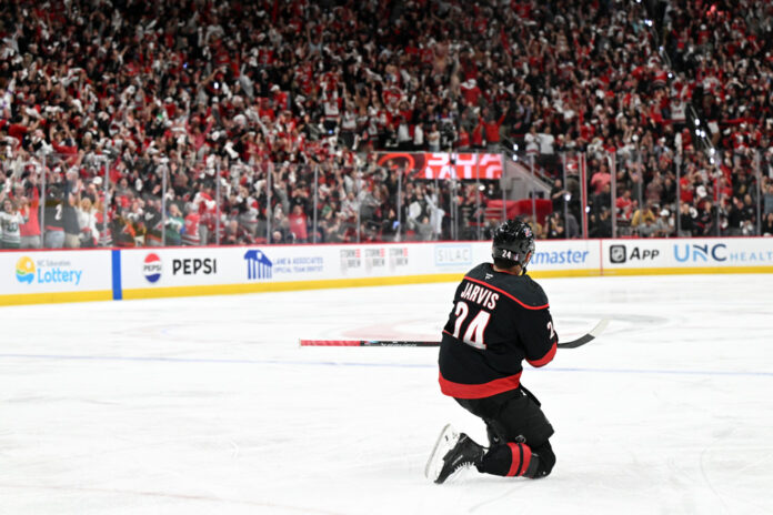 Seth Jarvis OT winner celebration Game 2 Stanley Cup Final Seth Jarvis Carolina Hurricanes celebrates toward the crowd after scoring overtime winner Game 2 Stanley Cup Final Lenovo Center Raleigh