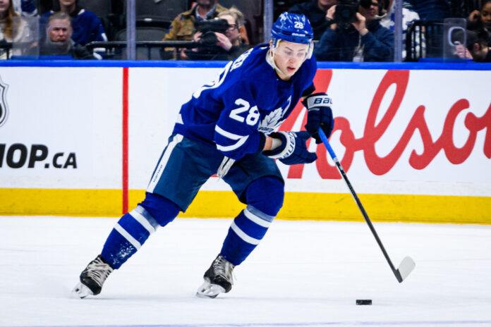 Troy Stecher Maple Leafs signing Toronto Maple Leafs defenseman Troy Stecher skates with the puck