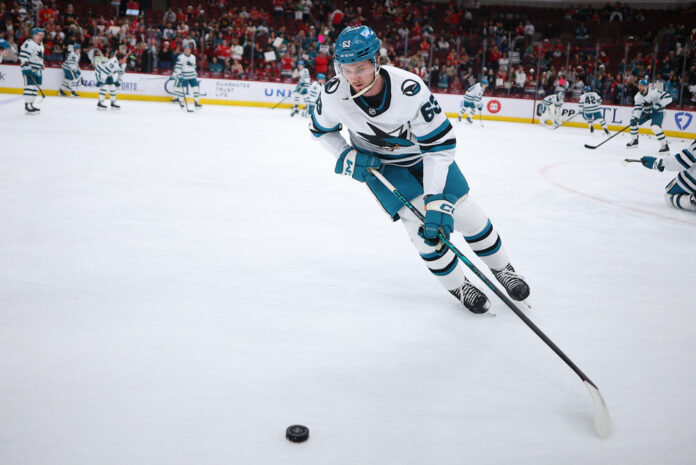 Zack Ostapchuk San Jose Sharks 2025-26 Zack Ostapchuk San Jose Sharks center skates with the puck