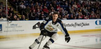 Andrew Agozzino Retires After 14-Year Pro Hockey Career Andrew Agozzino skating with the puck, retires from professional hockey after 14-year career