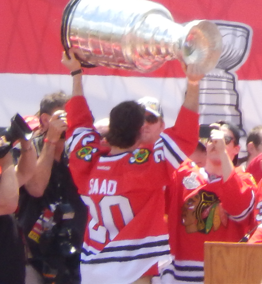Brandon Saad hoists the Stanley Cup with the Chicago Blackhawks