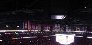 Canadiens Centre Ice Logo: Bell Centre Drops the Red Montreal Canadiens Centre Bell ice and banners, Reilly Walsh signing