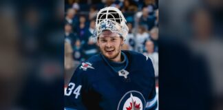 Michael Hutchinson Retires After 11 Seasons, Six NHL Teams Michael Hutchinson smiles in his Winnipeg Jets goalie gear at Canada Life Centre