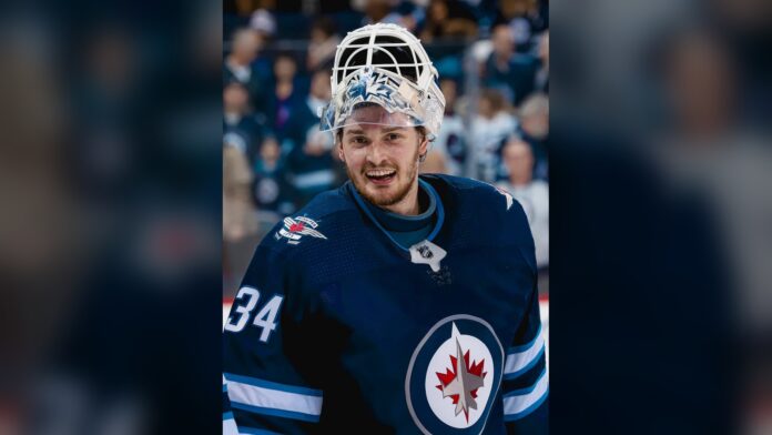 Michael Hutchinson Winnipeg Jets retirement Michael Hutchinson smiles in his Winnipeg Jets goalie gear at Canada Life Centre
