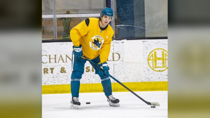 Michael Misa San Jose Sharks practice 2026 San Jose Sharks center Michael Misa handles the puck at Sharks practice in April 2026