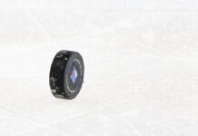 NHL Preseason Schedule: 65 Games in 8 Days Opens Today Official NHL puck standing on the ice