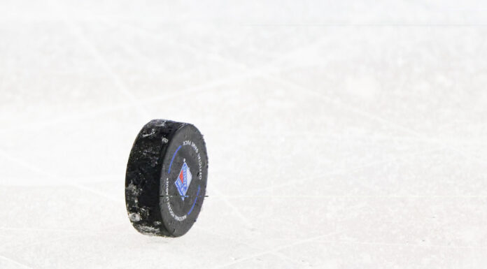 NHL Preseason Schedule: 65 Games in 8 Days Opens Today Official NHL puck standing on the ice