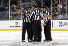 NHL Rule Changes: Players Want the Offside Review Gone NHL officials gather on the ice during a game