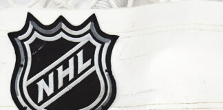 NHL Top 10 Teams 2026-27: Oilers Don’t Make the Cut NHL shield logo on the back of the net