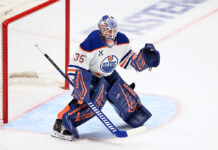 Tristan Jarry Mask: Tom and Jerry Mischief for the Oilers Edmonton Oilers goalie Tristan Jarry in goal during the 2026 Stanley Cup Playoffs