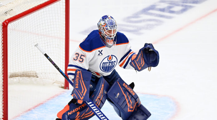 Tristan Jarry Mask: Tom and Jerry Mischief for the Oilers Edmonton Oilers goalie Tristan Jarry in goal during the 2026 Stanley Cup Playoffs