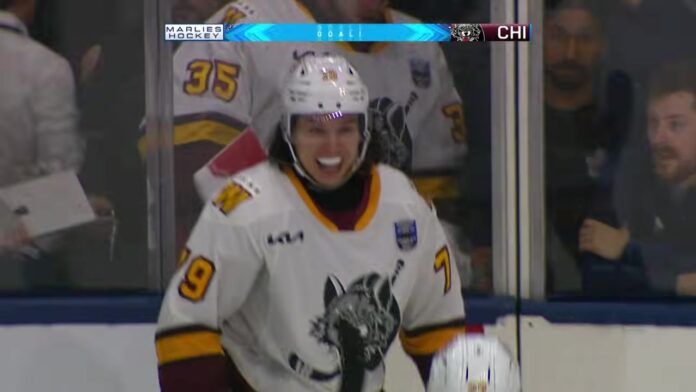 Viktor Neuchev Hurricanes contract signing 2026 Viktor Neuchev Chicago Wolves celebrates overtime winner Calder Cup Final Carolina Hurricanes one-year contract