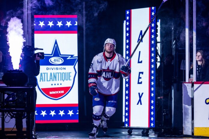 alex-nylander-flames-pto-2026 Alex Nylander takes the ice at the 2023 AHL All-Star Classic before signing a PTO with the Calgary Flames