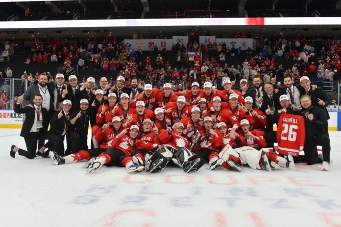 canada-hlinka-gretzky-cup-gold-2026-champions Team Canada poses with gold medals after winning the 2026 Hlinka Gretzky Cup in Edmonton