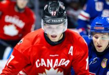 Hockey Canada, Canada Push Back on Russia’s IIHF Return Team Canada forward battles a United States player at the 2026 World Junior Summer Showcase in Windsor ahead of the 2027 World Junior Championship in Edmonton