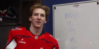 Cole Hutson on Ovechkin: ‘Happier Than I Was’ After First Goal Cole Hutson of the Washington Capitals holds the puck from his first NHL goal in the locker room
