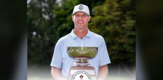 Garrett Rank Golf Title: NHL Ref Wins 4th Canadian Mid-Am NHL referee Garrett Rank holds the Canadian Mens Mid-Amateur Championship trophy at Brantford Golf and Country Club