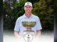 Garrett Rank Golf Title: NHL Ref Wins 4th Canadian Mid-Am NHL referee Garrett Rank holds the Canadian Mens Mid-Amateur Championship trophy at Brantford Golf and Country Club