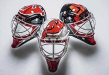 Devils Three-Goalie Plan: ‘Strike Lightning in a Bottle’ Jake Allen new New Jersey Devils goalie masks for the 2026-27 NHL season painted by Sylabrush