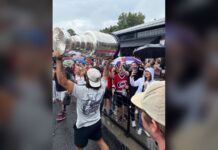 Jalen Chatfield Stanley Cup Day: Hoisting It in the Rain Jalen Chatfield hoists the Stanley Cup for Carolina Hurricanes fans during his day with the trophy in North Carolina