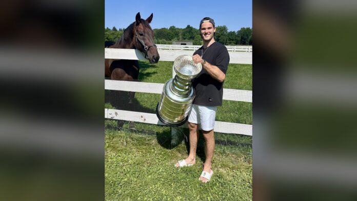 Mark Jankowski Stanley Cup day Dundas Ontario 2026 Mark Jankowski holds the Stanley Cup during his day with the trophy in Ontario