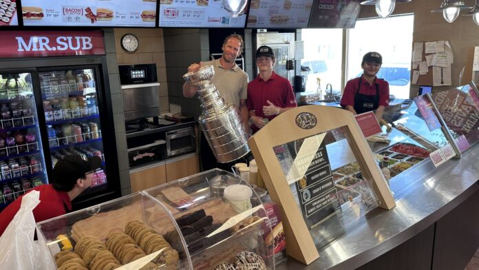 jordan-staal-stanley-cup-thunder-bay-2026 Jordan Staal holds the Stanley Cup during his day with the trophy in Thunder Bay, Ontario