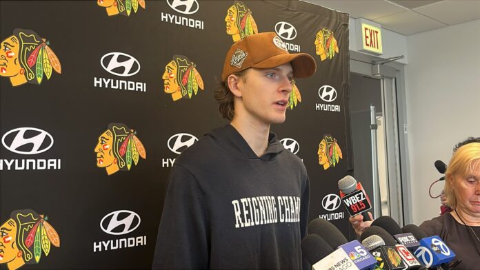 Kevin Korchinski Blackhawks contract 2026 Kevin Korchinski speaks to reporters at the Chicago Blackhawks practice facility