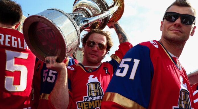 KHL Jersey Change: Gagarin Cup Champs Now Wear Gold Lokomotiv Yaroslavl players celebrate with the Gagarin Cup wearing gold championship jerseys