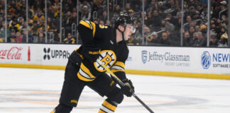 Mason Lohrei Trade Talk: ‘You’ve Got to Earn Your Spot’ Mason Lohrei Boston Bruins defenseman skates with the puck at TD Garden during the 2025-26 NHL season