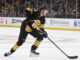 Mason Lohrei Trade Talk: ‘You’ve Got to Earn Your Spot’ Mason Lohrei Boston Bruins defenseman skates with the puck at TD Garden during the 2025-26 NHL season