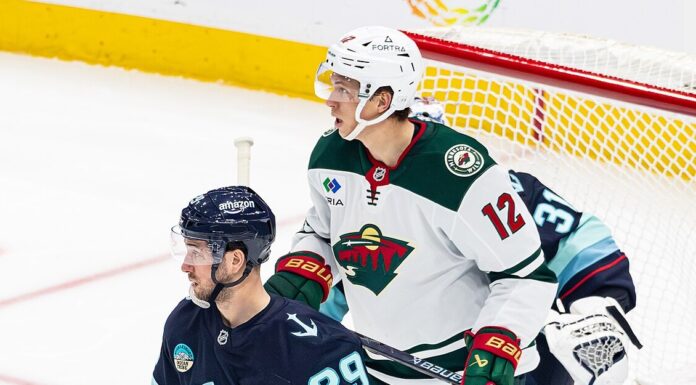 Matt Boldy Hat Trick: Wild Hold Off Blues 5-4 Matt Boldy of the Minnesota Wild sets up at the net front against Seattle