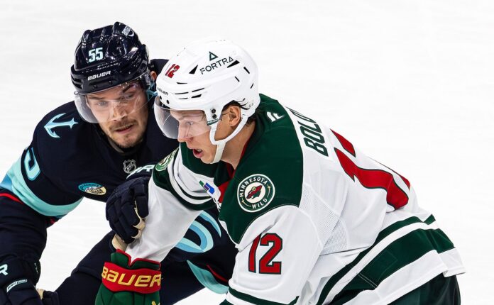 Matt Boldy Minnesota Wild vs Seattle Kraken January 2026 Minnesota Wild winger Matt Boldy battles for position against the Seattle Kraken