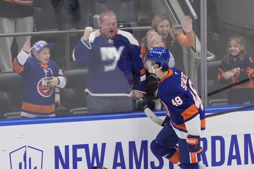 Matthew Schaefer celebrates a goal in front of Islanders fans at UBS Arena