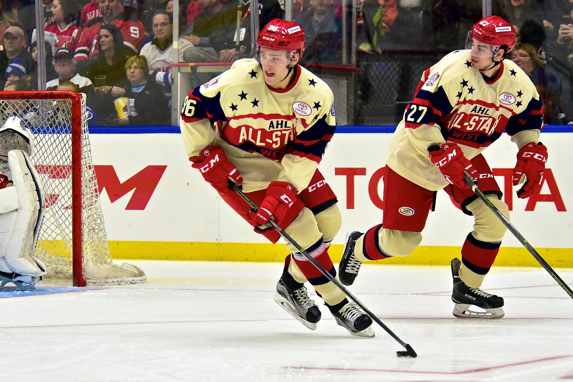 Mikko Rantanen carrying the puck in an AHL All-Star West sweater