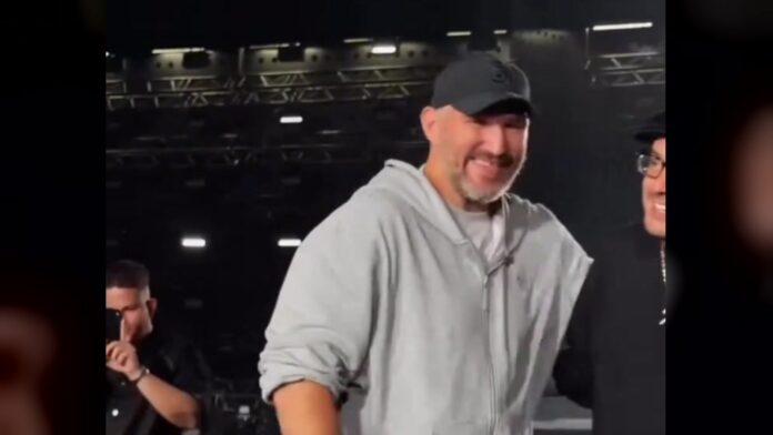Alex Ovechkin on stage with Basta and Guf at Luzhniki Alex Ovechkin smiles on stage at Luzhniki Stadium during the Basta and Guf concert in Moscow