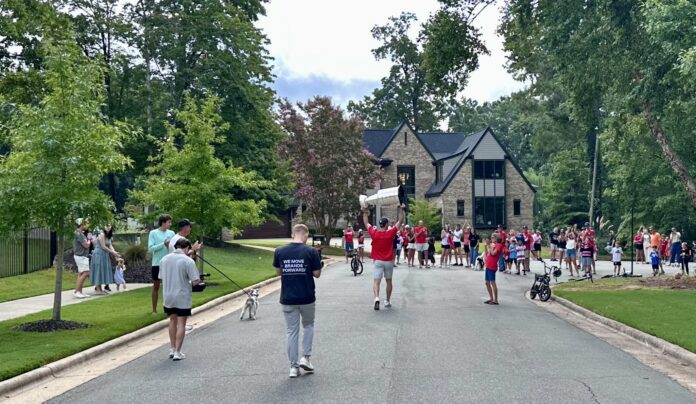 Jaccob Slavin carries Stanley Cup through Raleigh neighborhood Jaccob Slavin Carolina Hurricanes defenseman carries the Stanley Cup down his Raleigh neighborhood street during his day with the Cup August 2026
